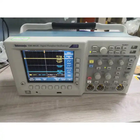 Tektronix TDS3012C 100MHz 1.25 GS/s Digital Phosphor Oscilloscope uesd - XG eqpt