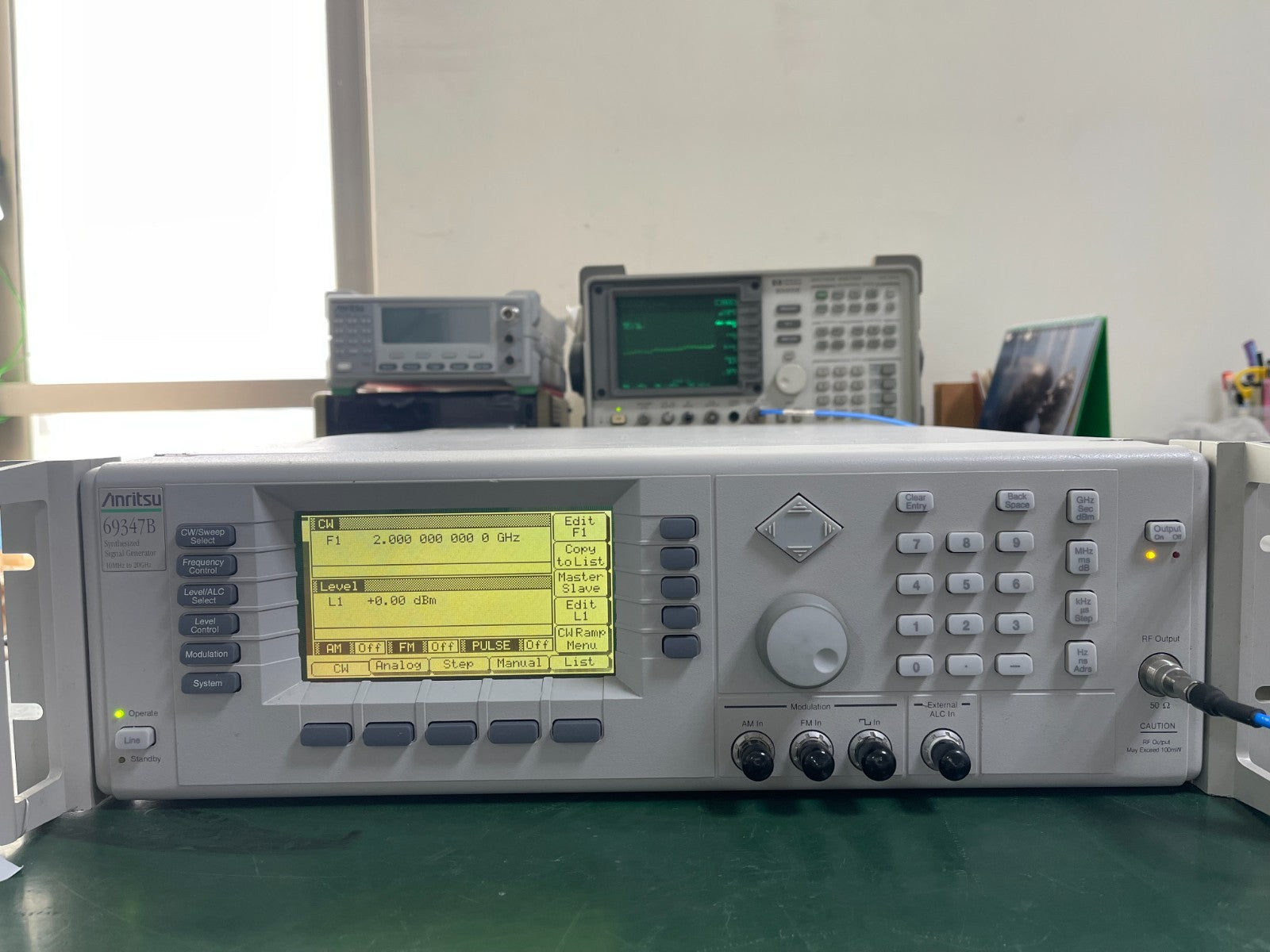 Anritsu 69347B Synthesized Signal Generator 10MHz - 20GHz , w/8 , 11 , 14 - XG eqpt