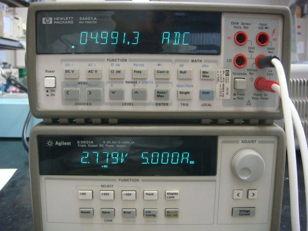 Agilent E3631A Triple Output +-25V 6V Power Supply