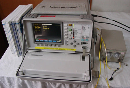 Agilent OmniBER725 Communication Analyzer J1409A-OP002/106/602/UK6