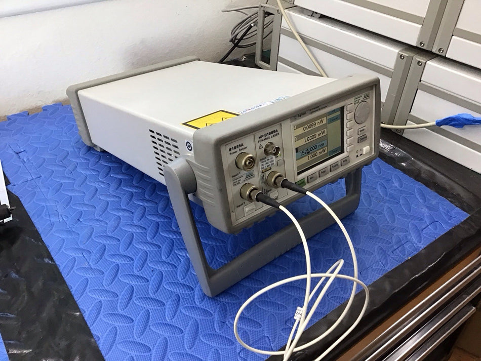 HP Agilent 8163B Optical 81689A Tunable Laser 81635A Sensor 1550nm Cal'd Cert